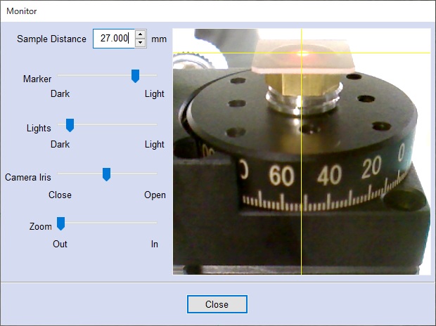 A single crystal sample is placed on a camera attached to Pulstec's s-Laue machine. Next to the image of the single crystal sample is a screenshot from their software that allows users to adjust the sample distance.