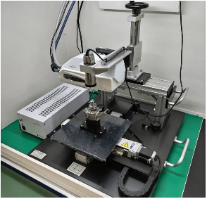 Pulstec’s m-Laue positioned on a tabletop with a prepared crystal sample.
